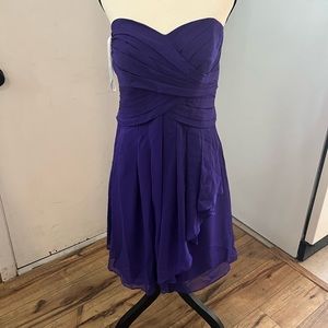 Women’s knee-length semi-formal/formal dress.